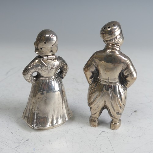 113 - Two Dutch silver novelty Figural Cruets, the lady in full dress with hinged head and pierced bonnet,... 