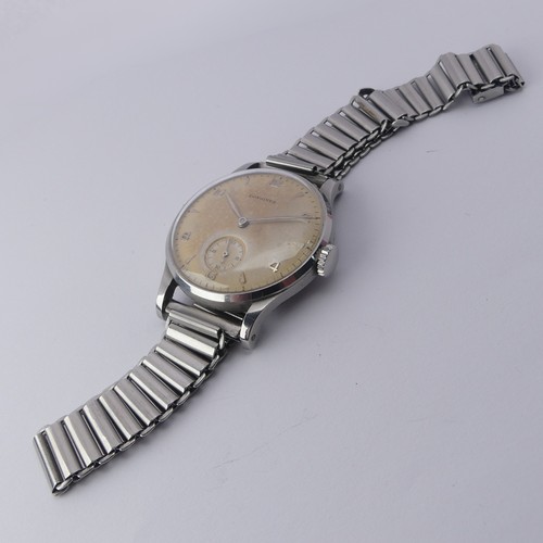 230 - A vintage stainless steel Longines Wristwatch, the signed dial with alternate steel baton and Arabic... 