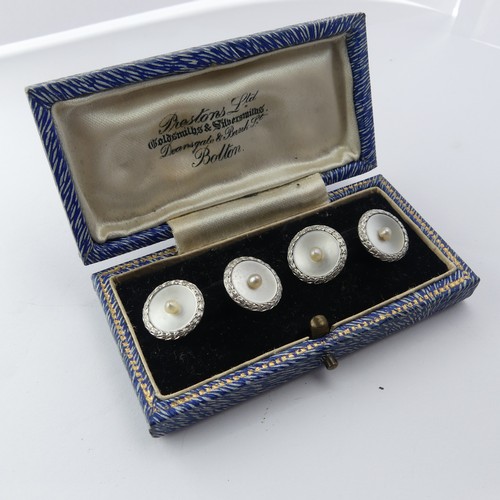 399 - A cased pair of Art Deco mother-of-pearl Cufflinks, with cultured pearl centres and textured platinu... 