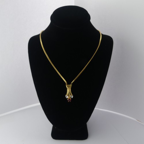 304 - A 9ct yellow gold Pendant, set red and white heart shaped pastes, on integral 9ct gold chain, 42cm l... 