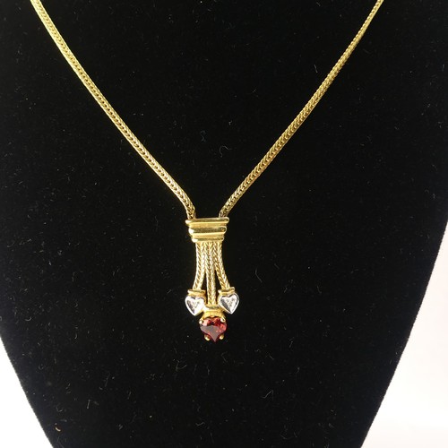 304 - A 9ct yellow gold Pendant, set red and white heart shaped pastes, on integral 9ct gold chain, 42cm l... 