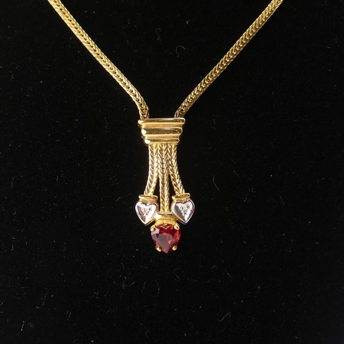 304 - A 9ct yellow gold Pendant, set red and white heart shaped pastes, on integral 9ct gold chain, 42cm l... 