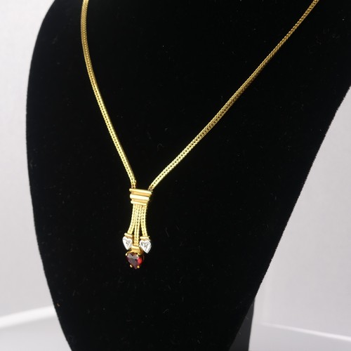 304 - A 9ct yellow gold Pendant, set red and white heart shaped pastes, on integral 9ct gold chain, 42cm l... 