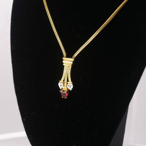 304 - A 9ct yellow gold Pendant, set red and white heart shaped pastes, on integral 9ct gold chain, 42cm l... 