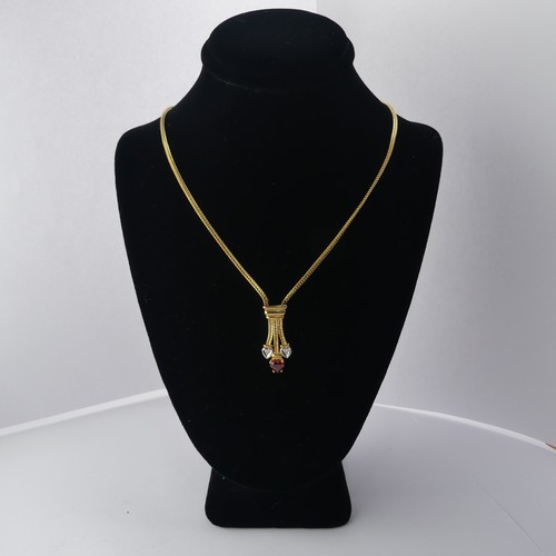 304 - A 9ct yellow gold Pendant, set red and white heart shaped pastes, on integral 9ct gold chain, 42cm l... 