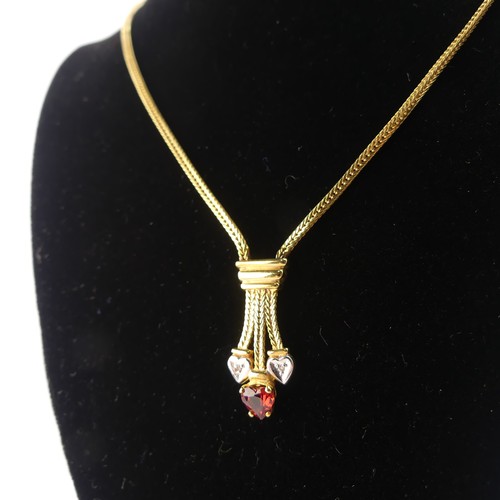 304 - A 9ct yellow gold Pendant, set red and white heart shaped pastes, on integral 9ct gold chain, 42cm l... 