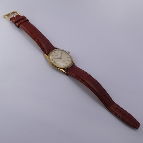 233 - A vintage Breitling Geneve gold plated Wristwatch, the silvered dial with gilt baton markers and Ara... 