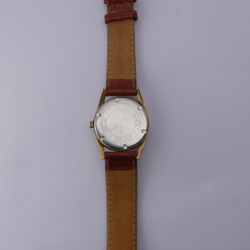 233 - A vintage Breitling Geneve gold plated Wristwatch, the silvered dial with gilt baton markers and Ara... 