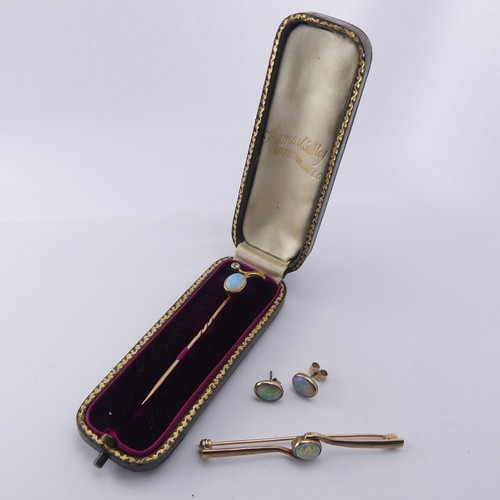 401 - An opal and diamond Stickpin, unmarked, together with a 9ct gold opal bar brooch and a pair of colle... 