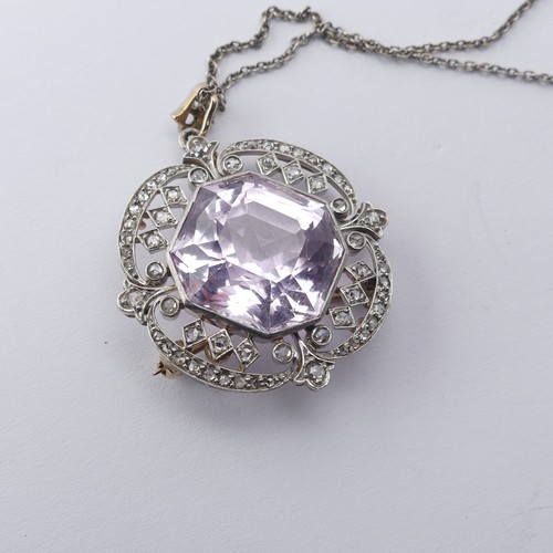 Marcus & Co., New York; An American Belle Epoque Pendant / Necklace, the central octagonal / square emerald cut kunzite 18mm wide within a pierced mount set single cut diamonds, all mounted in platinum, unmarked but tested, the reverse marked 'M&Co.', lacking original screw fitting brooch frame and now replaced with a soldered pin, 30mm wide, 12.6g, on an association 9ct white gold trace chain, 51cm long, 2.4g.