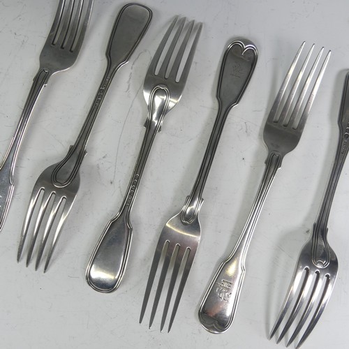 141 - A matched set of six early 19thC silver Forks, three by William Eley I & William Fearn, hallmark... 