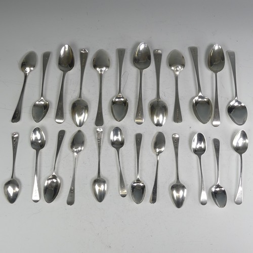 150 - A matched set of twelve George III silver Dessert Spoons, Old English pattern, various dates and mak... 