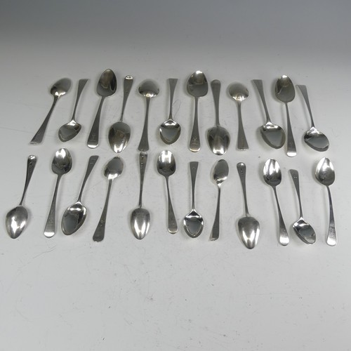 150 - A matched set of twelve George III silver Dessert Spoons, Old English pattern, various dates and mak... 