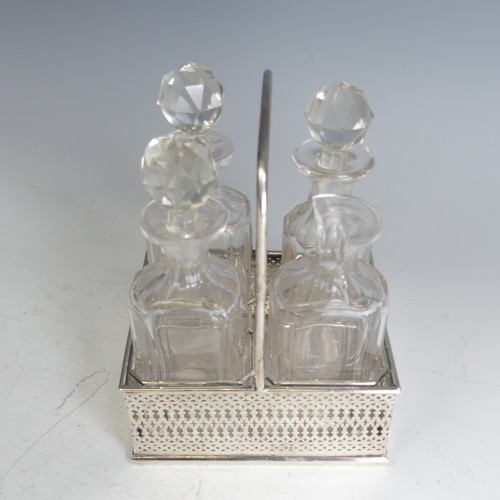 186 - A Victorian silver four bottle Cruet Stand, by Cartwright & Woodward, hallmarked Birmingham, 186... 