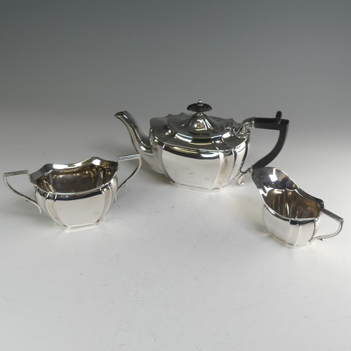 189 - An Edwardian silver three piece Tea Set, by Joseph Rodgers & Sons, hallmarked Sheffield 1908-10,... 