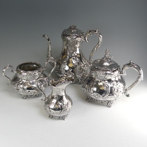 190 - A Victorian silver four piece Tea Set, hallmarked Sheffield, 1865, of baluster form with elaborate f... 