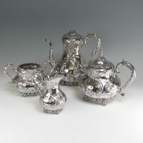 190 - A Victorian silver four piece Tea Set, hallmarked Sheffield, 1865, of baluster form with elaborate f... 