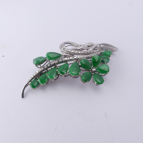 345 - A Chinese white gold and jade foliate Brooch, the reverse marked 18k, circa 1970's, 6.5cm long, tota... 