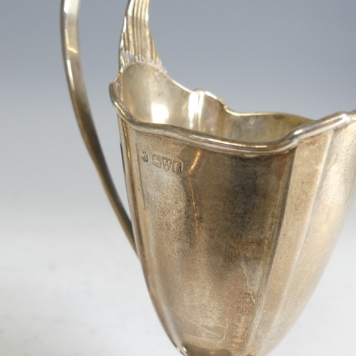 196 - An Edwardian silver Cream Jug, by James Deakin & Sons, hallmarked Chester 1905, in the Georgian ... 