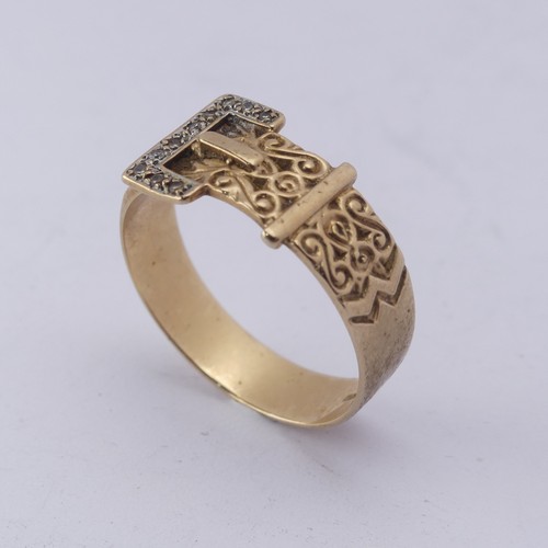 262 - A 9ct yellow gold Buckle Ring, set small diamond points, Size Y, 4.3g.