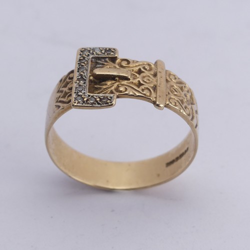 262 - A 9ct yellow gold Buckle Ring, set small diamond points, Size Y, 4.3g.