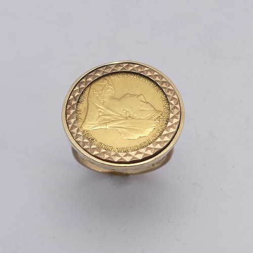 266 - A Victorian gold Half Sovereign, date obscured by 9ct gold ring mount, Size L, total weight 8.7g.... 