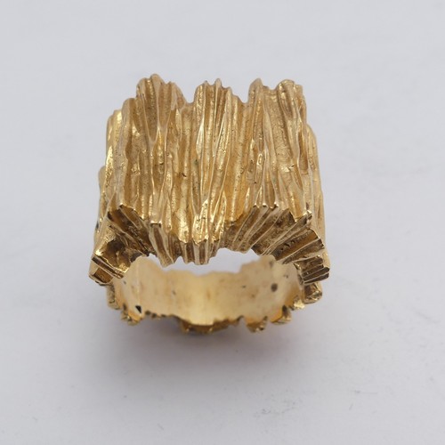 267 - A 14ct yellow gold Ring, with textured bark design, Size M½, 11.8g.