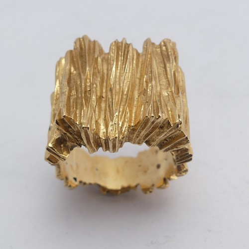 267 - A 14ct yellow gold Ring, with textured bark design, Size M½, 11.8g.