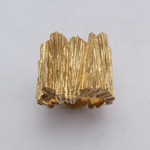 267 - A 14ct yellow gold Ring, with textured bark design, Size M½, 11.8g.