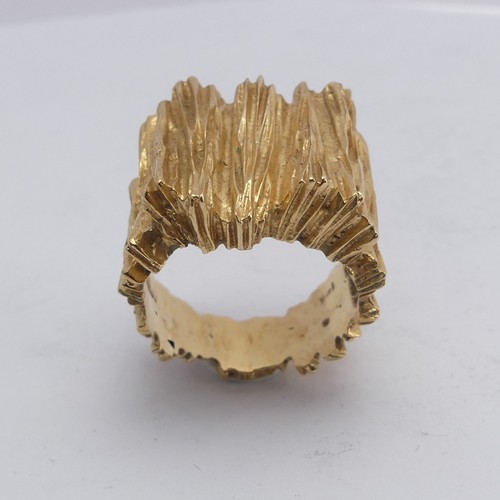 267 - A 14ct yellow gold Ring, with textured bark design, Size M½, 11.8g.