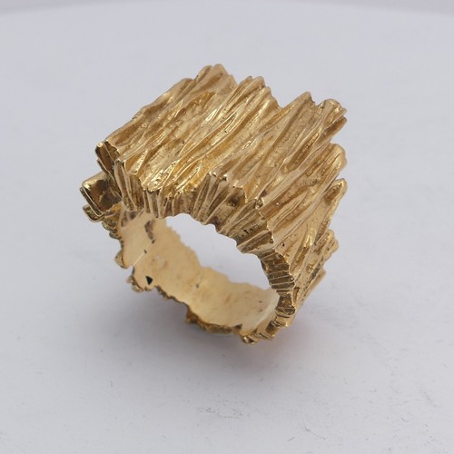 267 - A 14ct yellow gold Ring, with textured bark design, Size M½, 11.8g.