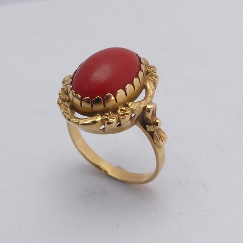 268 - A coral Dress Ring, the oval cabochon stone approx. 14mm long, mounted in 18ct yellow gold, Size N&f... 