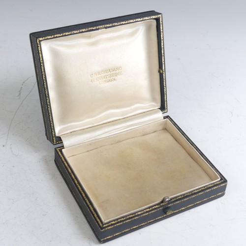 415 - Giuliano; A rectangular gilt tooled green leather Presentation Case, the silk lined lid marked 'C &a... 