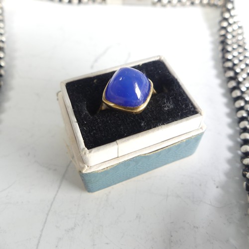 417 - An 18ct yellow gold Dress Ring, set domed blue stone, Size J, 2.5g, together with a small quantity o... 