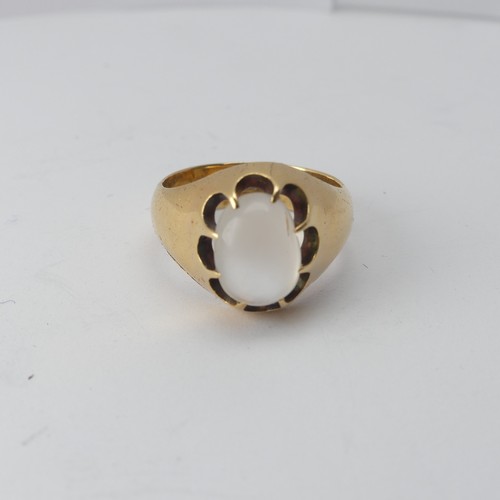 265 - An 18ct yellow gold Ring, claw set with an oval paste, Size Q, 9.2g. together with a small quantity ... 