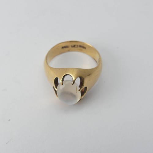 265 - An 18ct yellow gold Ring, claw set with an oval paste, Size Q, 9.2g. together with a small quantity ... 