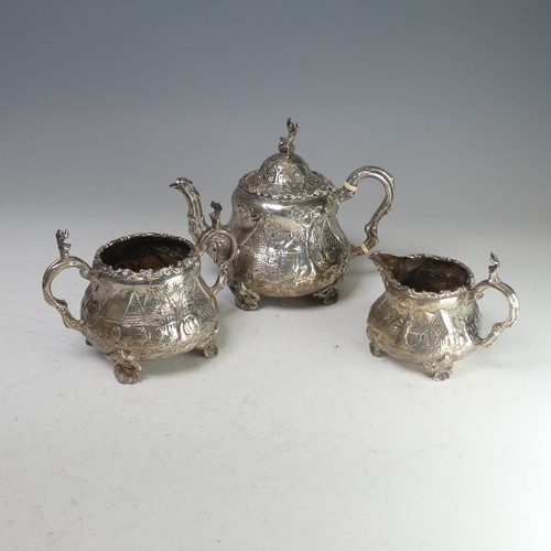 100 - A Victorian silver three piece Tea Set, by Robert Harper, hallmarked London, 1879, of circular form ... 