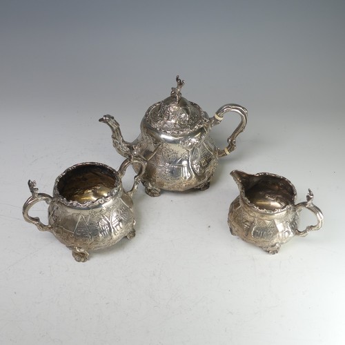 100 - A Victorian silver three piece Tea Set, by Robert Harper, hallmarked London, 1879, of circular form ... 