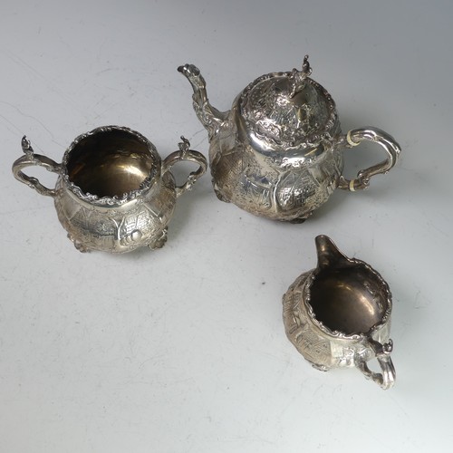 100 - A Victorian silver three piece Tea Set, by Robert Harper, hallmarked London, 1879, of circular form ... 