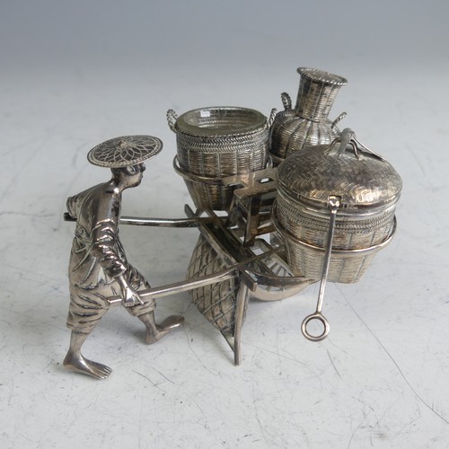 114 - A Chinese novelty silver Cruet, in the form of a richshaw, with mustard, open salt and pepper 'baske... 