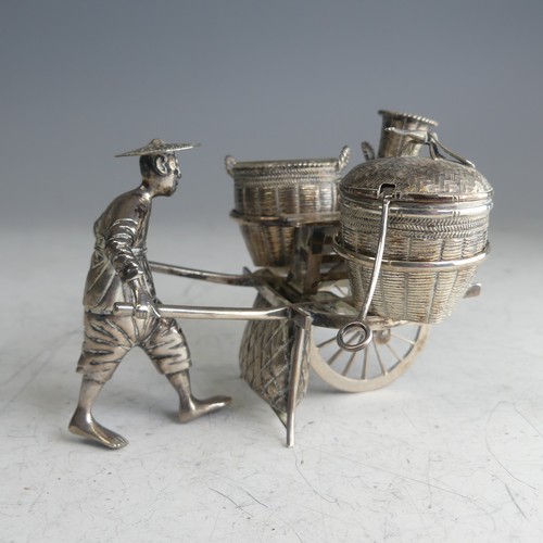 114 - A Chinese novelty silver Cruet, in the form of a richshaw, with mustard, open salt and pepper 'baske... 