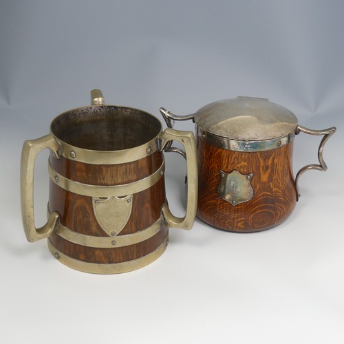 552 - A Victorian metal bound oak Tyg, H 17 cm, together with a silver plate mounted oak ice Bucket, H 15 ... 