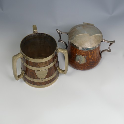 552 - A Victorian metal bound oak Tyg, H 17 cm, together with a silver plate mounted oak ice Bucket, H 15 ... 