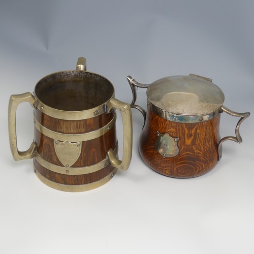 552 - A Victorian metal bound oak Tyg, H 17 cm, together with a silver plate mounted oak ice Bucket, H 15 ... 