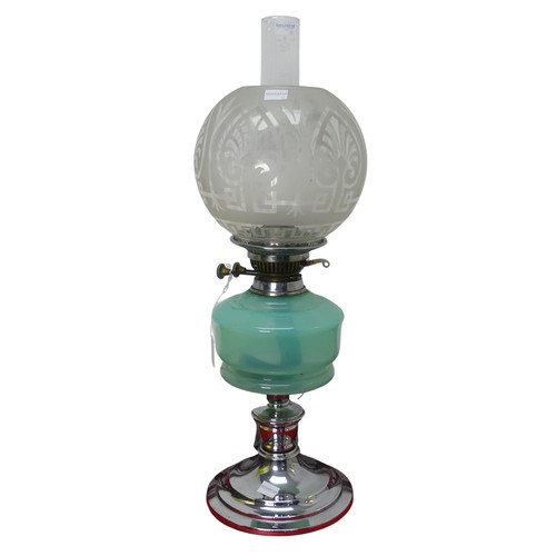 486 - An Art Deco style chrome Oil Lamp, with green glass reservoir and etched glass shade, stamped '... 