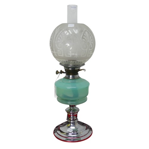 486 - An Art Deco style chrome Oil Lamp, with green glass reservoir and etched glass shade, stamped '... 