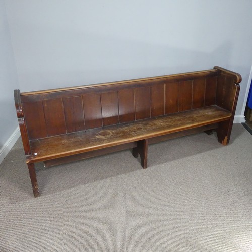 601 - A large antique oak Church Pew, with panelled back and reeded arm supports, W 214 cm x H 84 cm x D 5... 