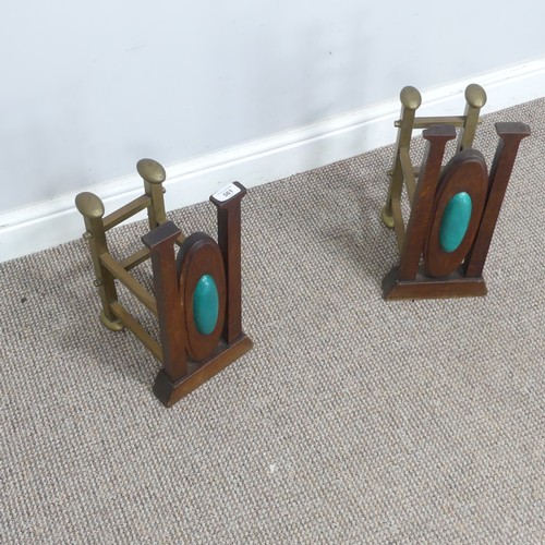 561 - A pair of Arts and Crafts oak and brass Andirons, inset with central cabochons, W 20 cm x H 41 cm x ... 