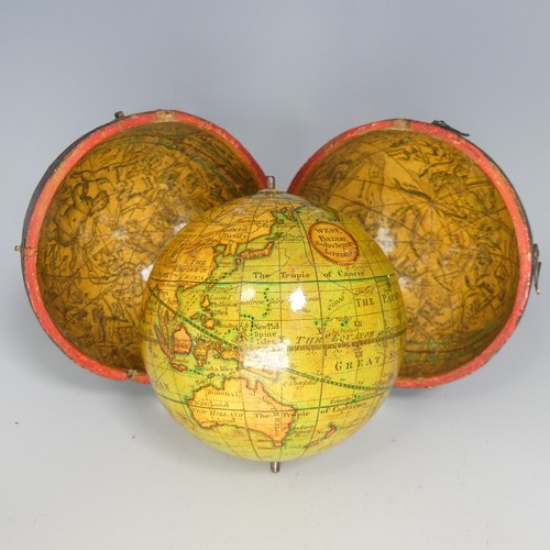A George III English 3-inch diameter terrestrial pocket Globe, by J. Mynde Sc. inscribed 'West, Bazaar, Soho Square London', Antarctica with no land shown, the continents outlined and faintly shaded in green, red, yellow and orange and showing national boundaries in dotted outline, rivers, lakes, deserts and place names, Southern Africa showing 'Country of the Hotentots' and 'Country of the Cafres' , China showing the Great Wall, Australia labeled New Holland, central South America labelled Amazons Country, no USA, pre-War of Independence, California as a peninsula, and 'Sea 1772' within the Arctic Circle, in a spherical wooden fish skin covered case, the interior with typical astronomical and zodiac lining.