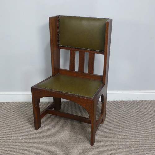 580 - An Arts and Crafts oak occasional Chair, attributed to Leonard Wyburd for Liberty & co, with uph... 